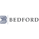 Bedford Group/TRANSEARCH logo